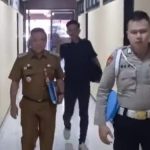 Pj Bupati Talaud saat berada di Mapolda Sulut, foto (ist)