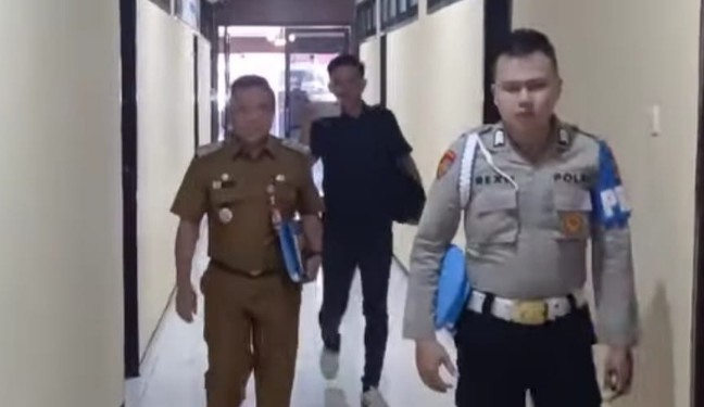 Pj Bupati Talaud saat berada di Mapolda Sulut, foto (ist)