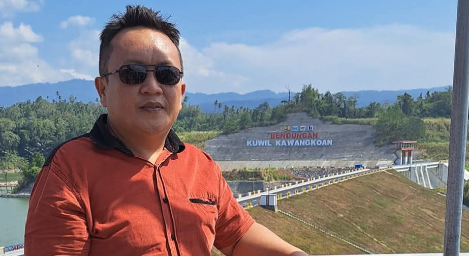 Penjabat Hukumtua Desa Kumelembuai, Hansye Mintalangi, SH (foto:dok pribadi)