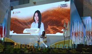 Miracle Sengkey saat membawakan sambutan laporan panitia di acara Musda Tidar Sulut, (foto : mediaalternatif)