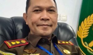 Dr. Reinhard Tololiu