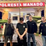 Tersangka saat diamankan di Polresta Manado