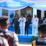 Gubernur YSK saat membacakan sambutan di Upacara Hari Bhayangkara ke 80, halaman Mapolda Sulut, Rabu (1/7/2026)
