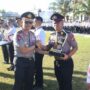 Wakapolda Sulut Brigjen Pol Awi Setiyono menyerahkan piala dan hadiah kepada para pemenang berbagai lomba yang telah digelar untuk memeriahkan peringatan Hari Bhayangkara ke-80.
