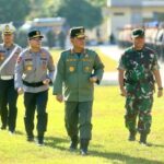 Gubernur Sulawesi Utara, Mayjen TNI (Purn.) Yulius Selvanus, S.E., memimpin Apel Gelar Pasukan Tanggap Bencana Dampak El Nino Tahun 2026 di Lapangan Apel Mapolda Sulut, Selasa (4/8/2026).