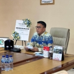 Sekprov Tahlis Gallang saat membuka Forum Koordinasi Pengendalian Mutu Pelayanan Keluarga Berencana (KB) tingkat provinsi, Jumat (21/8/2026).
